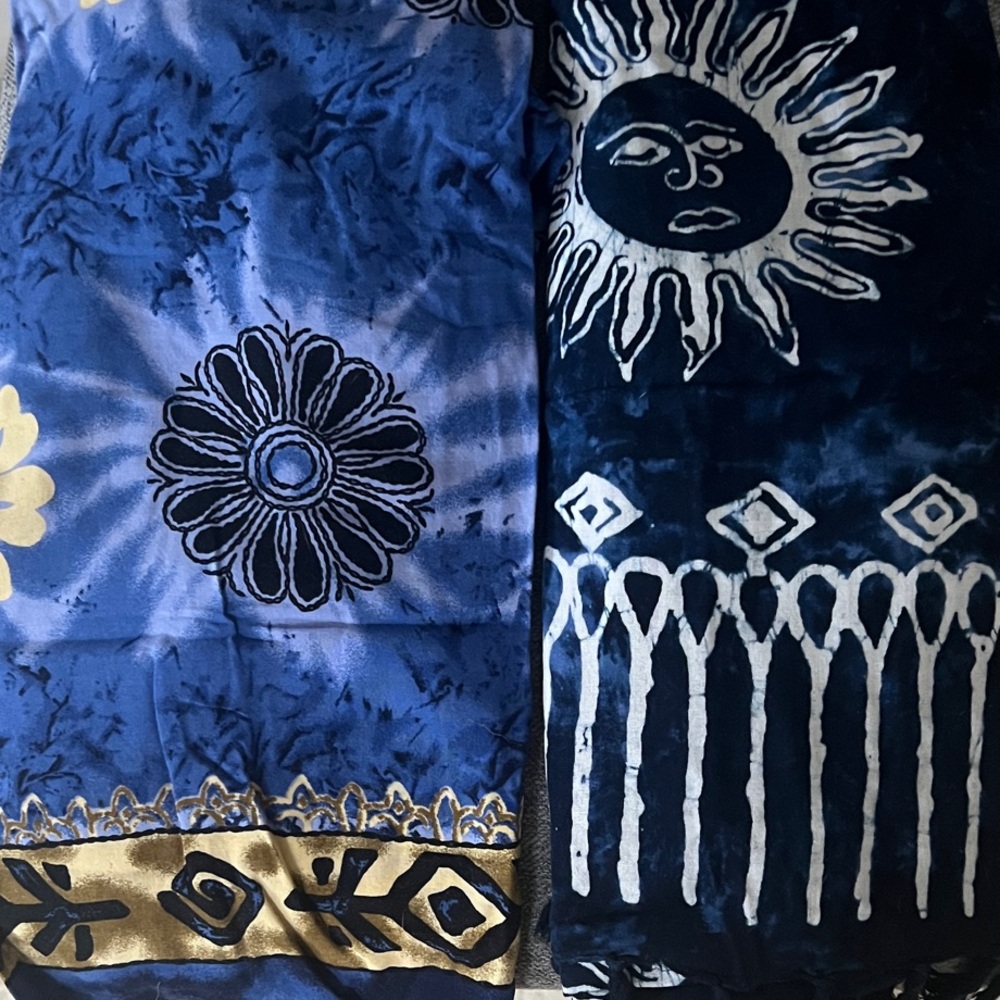 Two Blue and Gold Sun and Floral Patterned Fabric